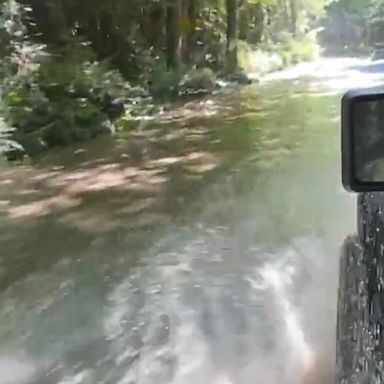 Floodwaters inundated this mountain road in British Columbia after the historic heat wave triggered a “significant amount of snowmelt,” according to Canadian officials.