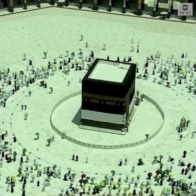 Tens of thousands of vaccinated Muslim pilgrims circled Islam's holiest site in Mecca while socially distanced and wearing masks as the coronavirus takes its toll on the hajj for a second year.