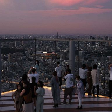 VIDEO: Tokyo prepares, wildfires burn, heavy rain inundates China: World in Photos, July 22  