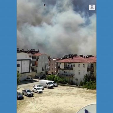 Firefighters used aircraft to dump water on a blaze that is threatening residential areas in Turkey.