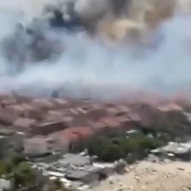 Officials in Italy battled wildfires that raged across the country, including in the Dannunziana forest near Pescara, where at least 100 people were evacuated.