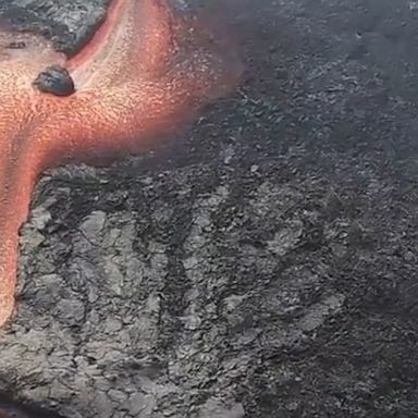 Channels of lava flowed from the Cumbre Vieja volcano on the Spanish island La Palma, which was captured by aerial footage.