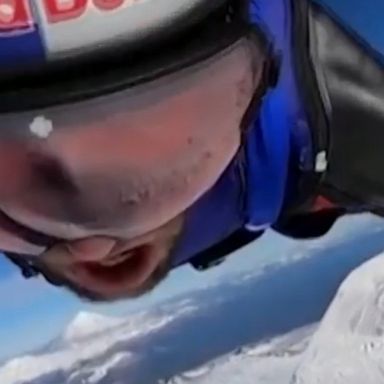 A wingsuit pilot pulls a death-defying feat by flying around 30 feet into the crater of an active volcano, before escaping.