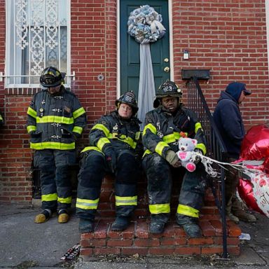 VIDEO: A Baltimore fire, Australia Day and a mudslide: World in Photos, Jan. 26