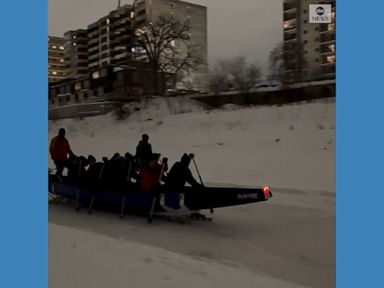 WATCH:  Rowers cruise down frozen river in Winnipeg