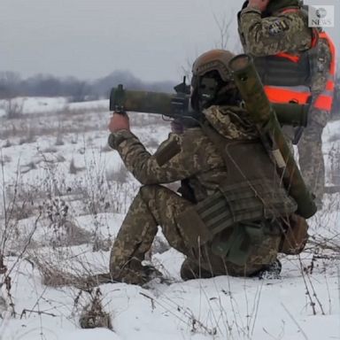 Ukrainian troops in the army division of radiochemical and biological protection trained in combat shooting and tactics amid escalating border tensions with Russia.