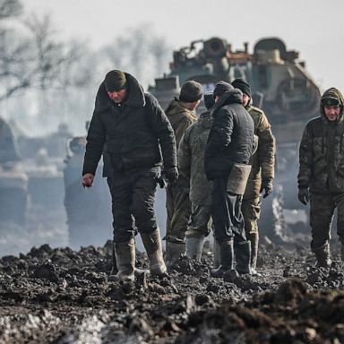 VIDEO: Russian troops, harsh weather and Olympians come home: World in Photos, Feb. 22.