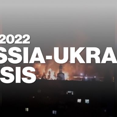 At least eight people were injured after a Russian rocket struck a residential building in a suburb of Kyiv early Friday as Russian forces draw close to Ukraine's capital, authorities said.