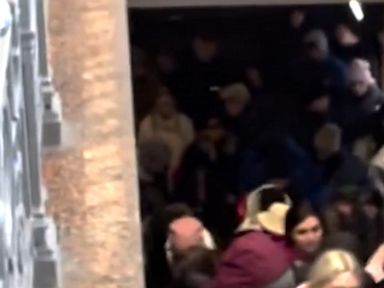 WATCH:  Hundreds wait to board at train station in Ukraine
