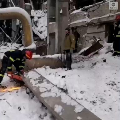 Emergency workers in Ukraine worked to clear rubble from ruined buildings and searched for people who may be trapped following an airstrike in the area. 