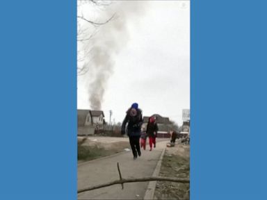 WATCH: People in Ukraine flee amid shelling