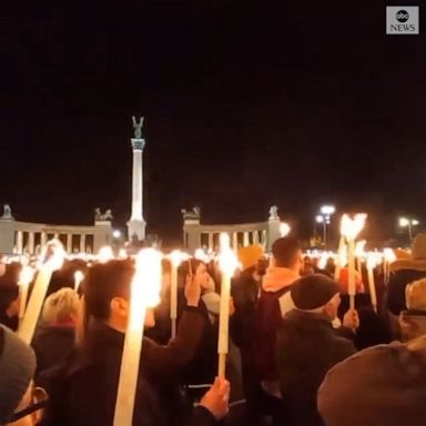 People in Budapest and Hungary held candles and sang at a vigil, calling for an end to the conflict in Ukraine. 