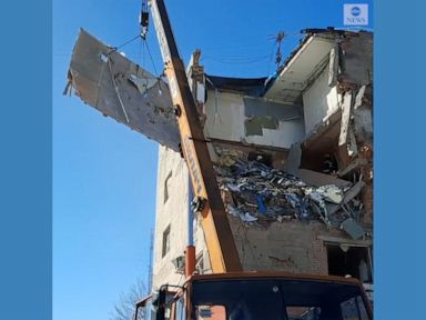 WATCH: Ukrainian rescue workers respond to damaged residential building in Kharkiv
