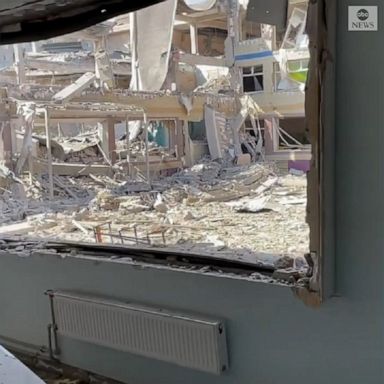 A former student walked through the ruins of the school he graduated from in Mariupol, after it was damaged by shelling. 