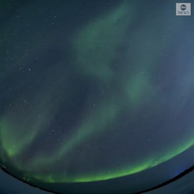 A photographer captured time-lapse footage of the northern lights over Yellowknife, Canada, while traveling. 