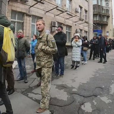 Hundreds of Ukrainians stood in a long line outside Kyiv's main post office to buy postage stamps featuring a Ukrainian soldier making a crude gesture at a Russian ship.