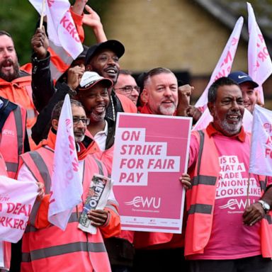 The move pauses strikes that have, at times, disrupted mail and train service across England. 