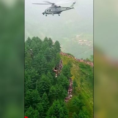 The broken cable car in the mountainous region of Pakistan left the passengers stranded nearly 1,000 feet off the ground. 