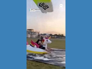 WATCH:  Skydiver lands on inflatable unicorn