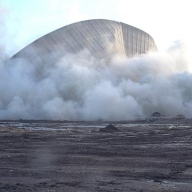 VIDEO: Controlled explosion brings down cooling tower in Germany