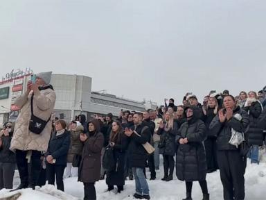 WATCH:  People chant 'Navalny' as Russian opposition leader's body arrives for funeral
