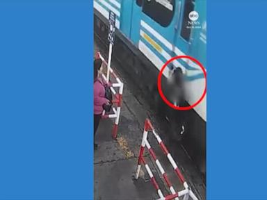 WATCH:  Man almost hit by train while staring at phone