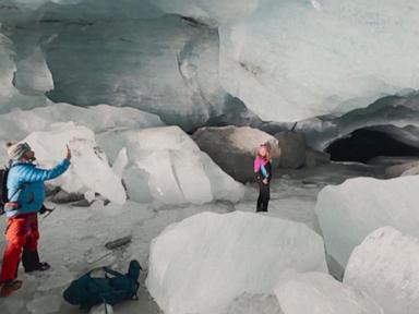 WATCH:  Hikers explore a beautiful, short-lived ice cave inside a glacier