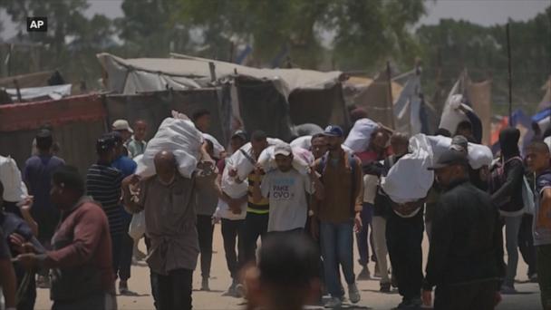 36 killed in shooting near Gaza aid site, health officials say