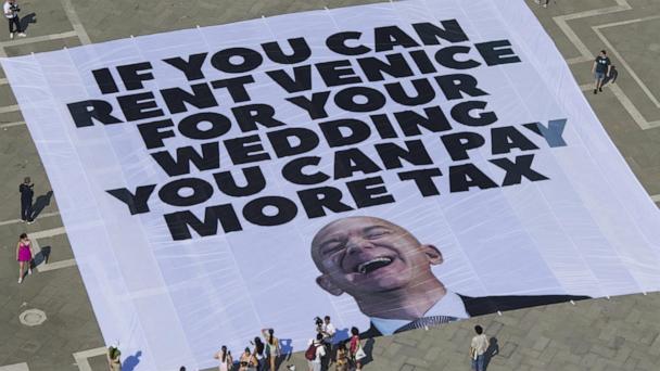 Jeff Bezos and fiancée arrive in Venice after protests force wedding venue change