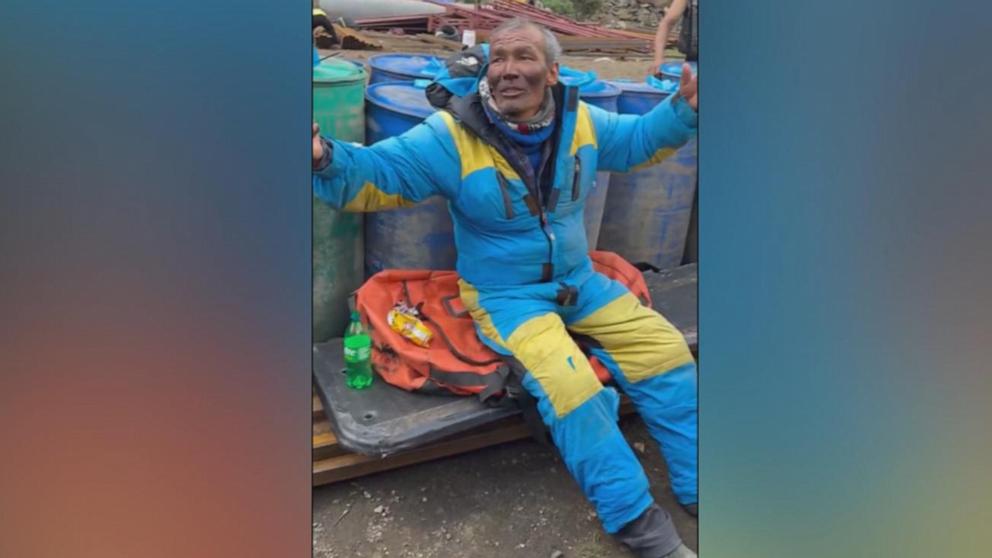 The sherpa, identified as Hillary Dawa Sherpa, was discovered by a garbage collection team that spotted him "sliding and crawling" down an icefall just above Everest base camp, officials said.