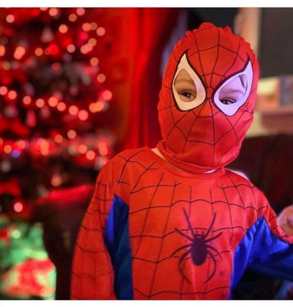 PHOTO: With the United Kingdom mired in the second week of an unprecedented lockdown over the COVID-19 outbreak, Andrew Baldock and Jason Baird in Stockport, England, had an idea to run around as Spider-Man to cheer up children stuck indoors. 