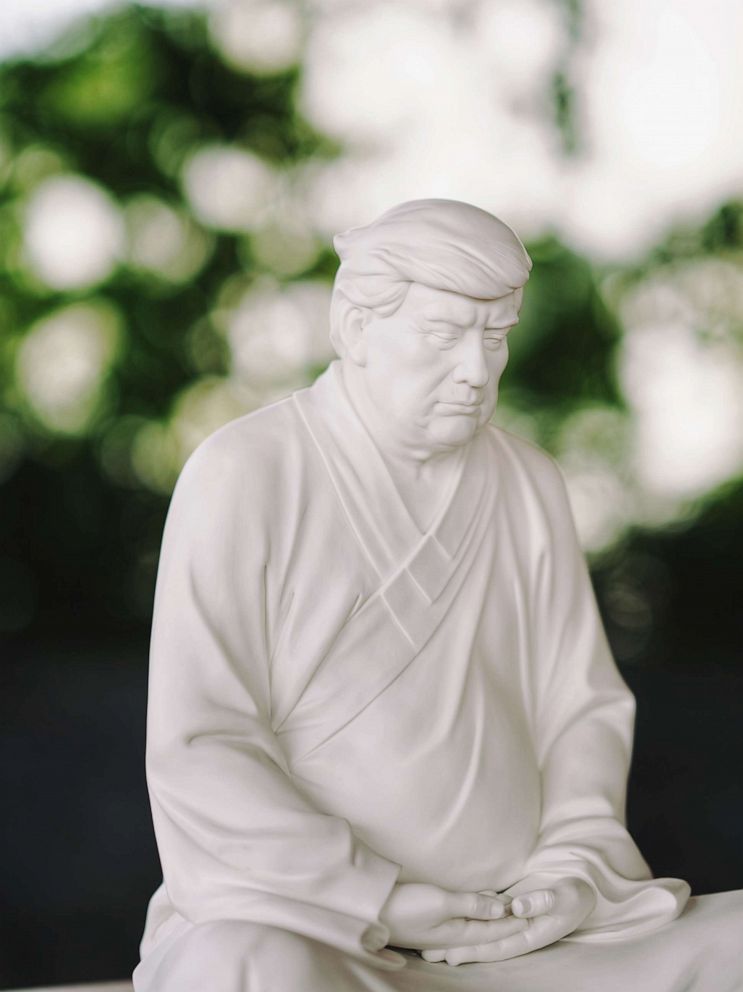 PHOTO: Artist Hong Jinshi from Xiamen, China, normally designs furniture, was inspired to design Trump as Buddha by one of Trump’s nicknames in China: ‘King of Knowing Everything.’