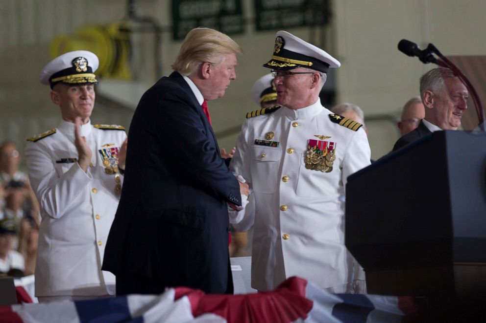 PHOTO: President Donald Trump shakes hands with Capt. Richard McCormack, commanding officer of USS Gerald R. Ford, during Ford's commissioning ceremony at Naval Station Norfolk in Norfolk, Va., on July 22, 2017.