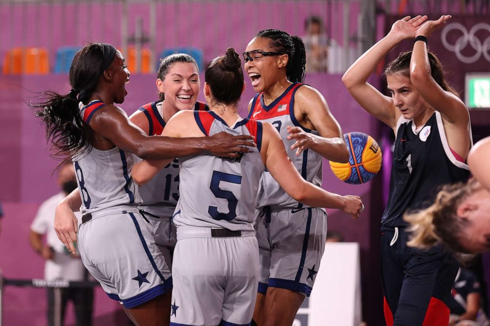 PHOTO: Jacquelyn Young, Stefanie Dolson, Kelsey Plum, and Allisha Gray of Team United States celebrate victory and winning the gold medal in the 3x3 Basketball competition on day five of the Tokyo 2020 Olympic Games on July 28, 2021 in Tokyo, Japan.