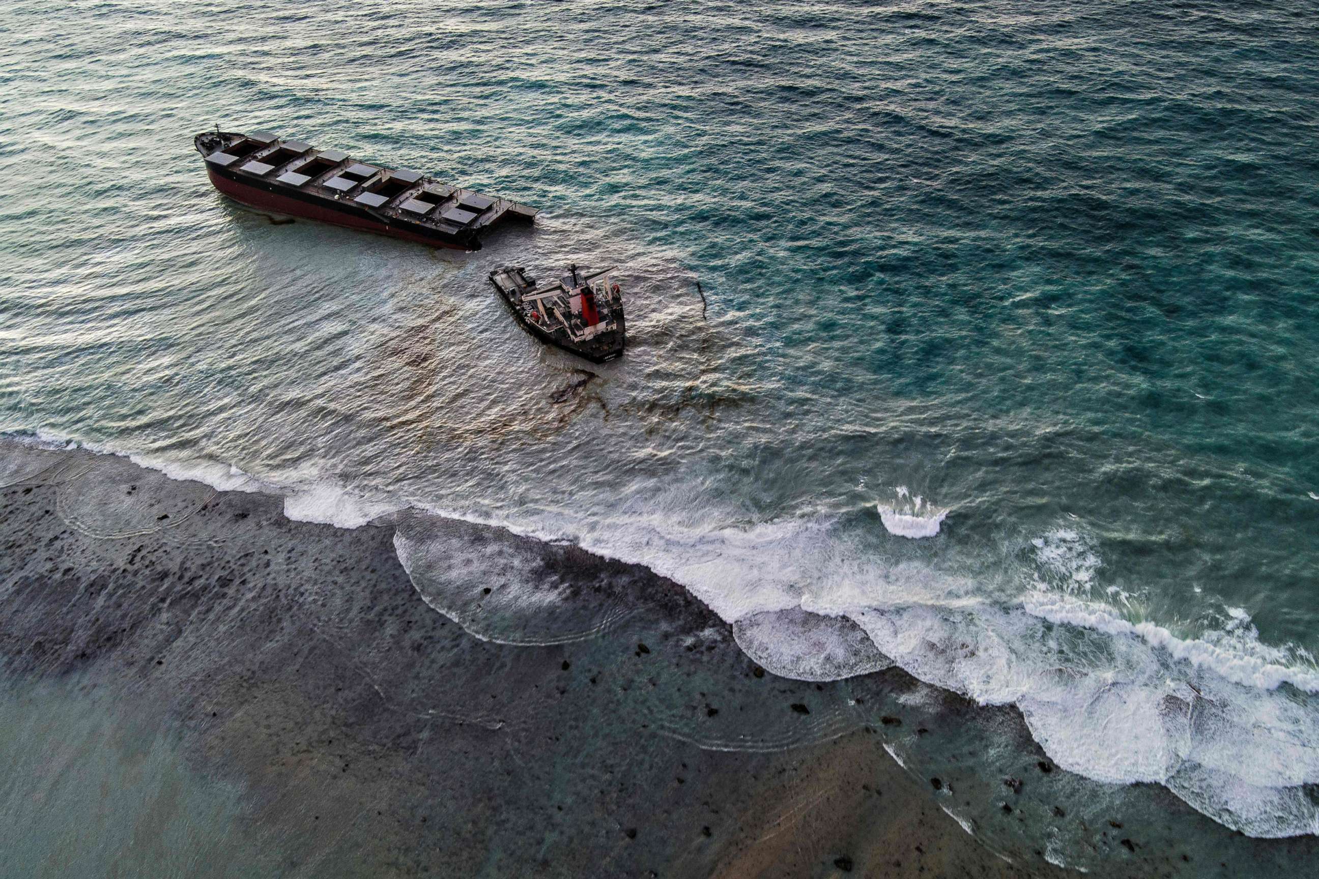 PHOTO: Oil from the split MV Wakashio bulk carrier is carried towards the shore near Blue Bay Marine Park, Mauritius, Aug. 16. 2020.