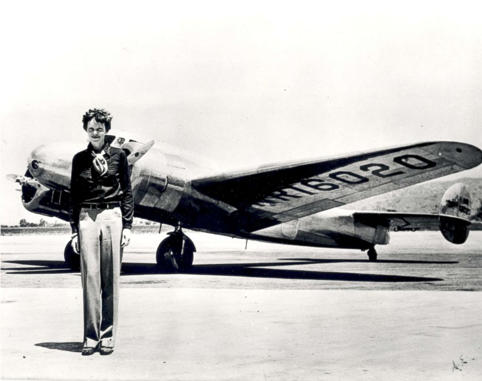 PHOTO: Amelia Earhart stands in front of the Lockheed Electra in which she disappeared in 1937.