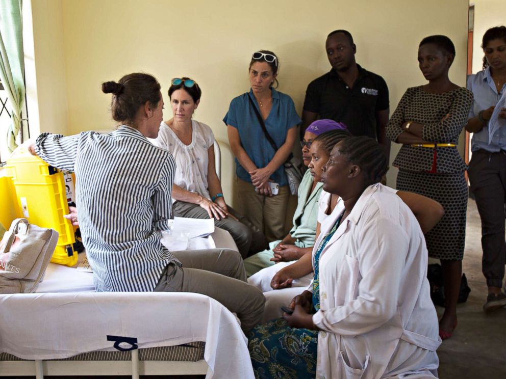 PHOTO: Christy Turlington Burns trains nurses in Tanzania to use a We Care Solar suitcase. The energy the suitcases harness will be used to provide light during nighttime deliveries and power medical tools.