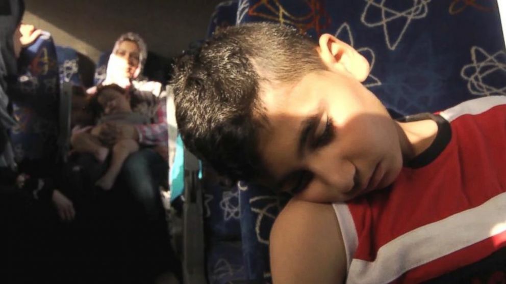 The Akasha family, made up of Rania Akasha and her four children, from Baton Rouge, Louisiana, leave Gaza on Sunday, July 13, 2014. They were in Gaza on vacation visiting relatives when the conflict started.