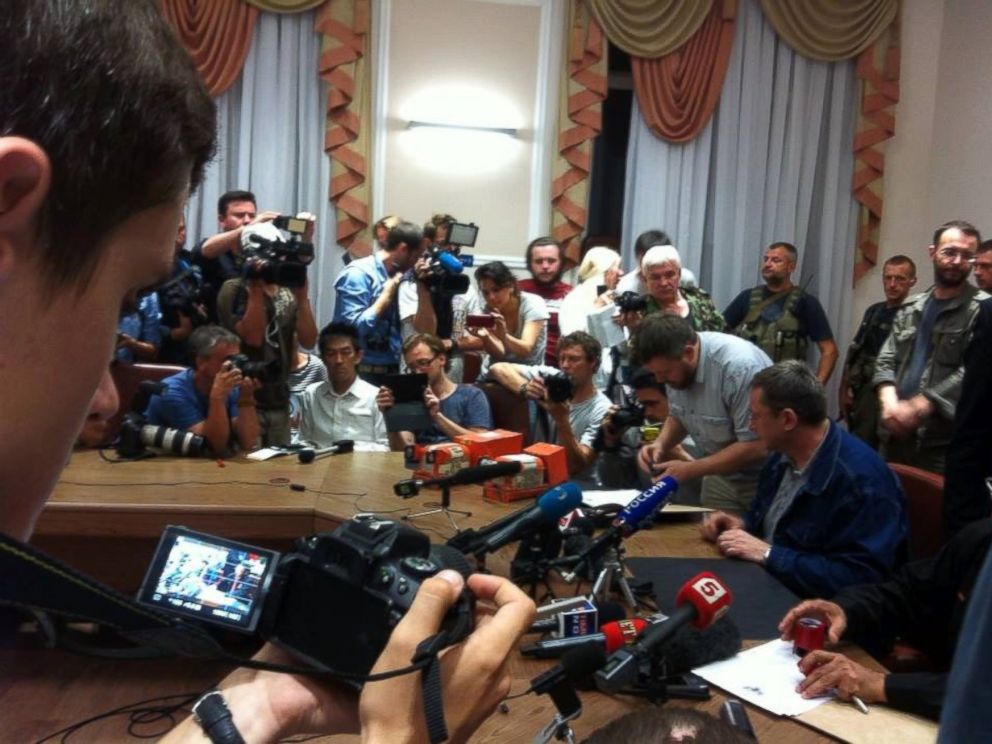PHOTO: Separatists handed over the black boxes from the downed Malaysia Airlines flight to investigators today in Donetsk, Ukraine.