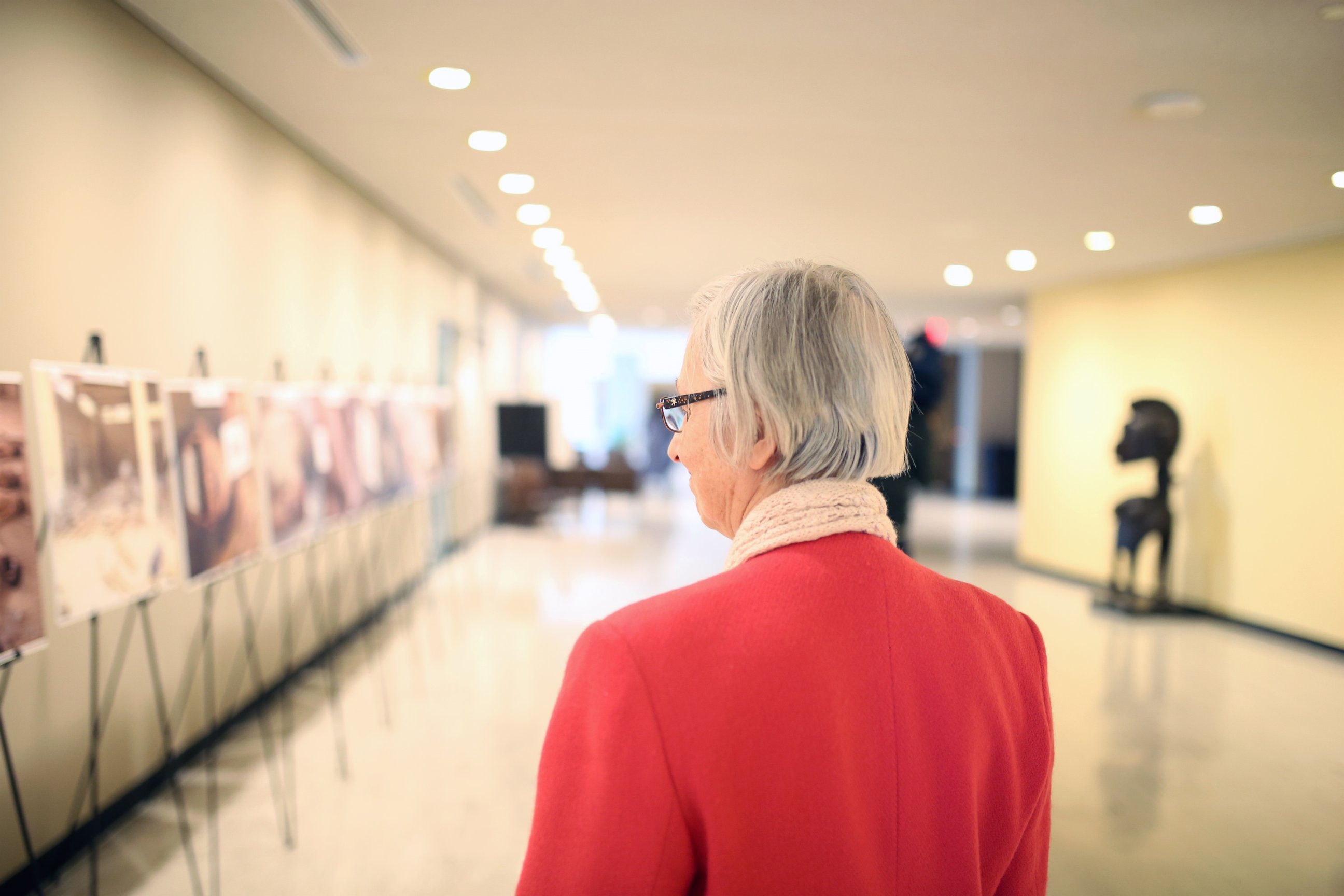 PHOTO: A viewer looks on at the "Caesar" photo exhibition at the United Nations Headquarters in New York, March 13, 2015.