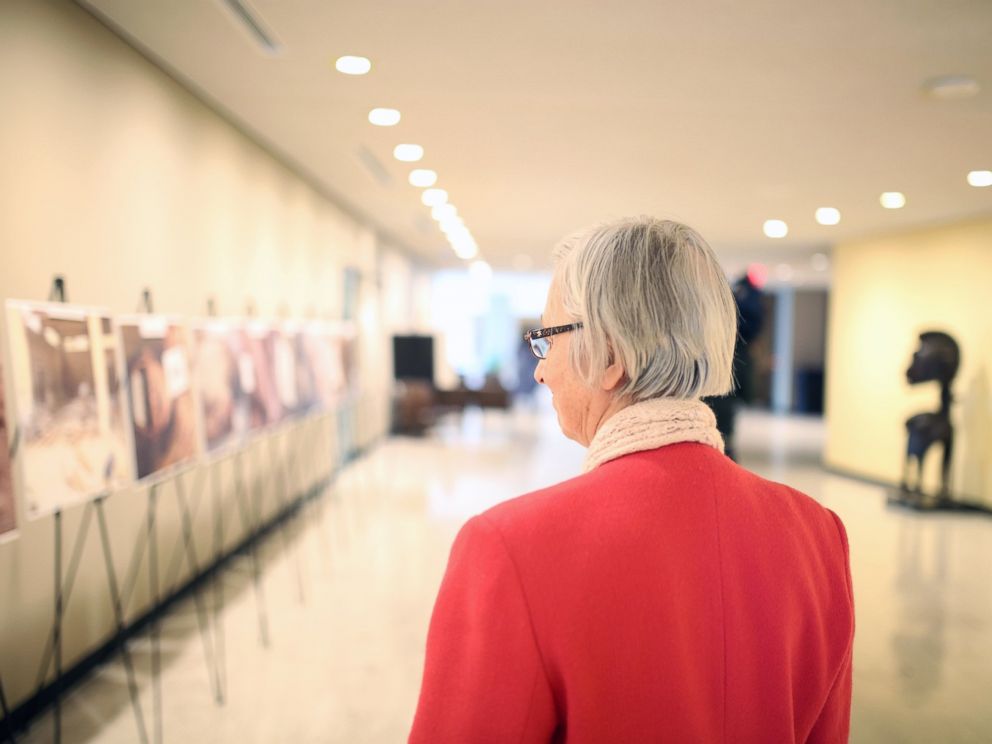 PHOTO: A viewer looks on at the Caesar photo exhibition at the United Nations Headquarters in New York, March 13, 2015.