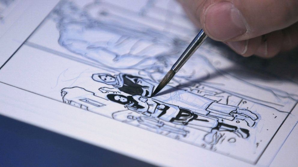 PHOTO: Dalibor Talajic drawing a panel from "Madaya Mom."