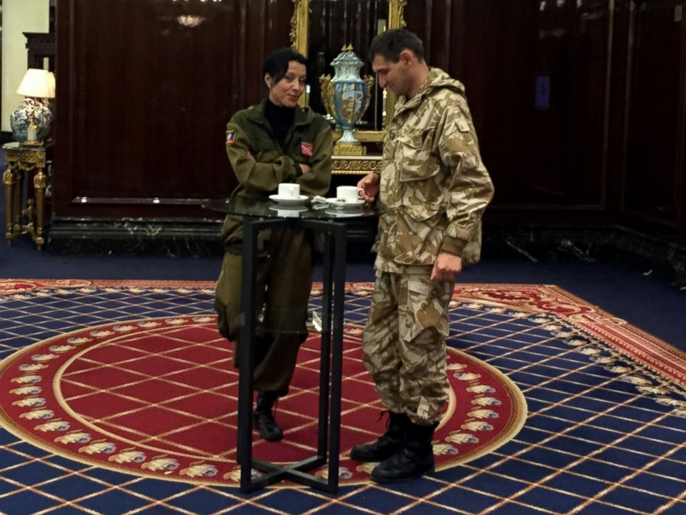 PHOTO: Two representatives of the self-proclaimed Donetsk People's Republic, the pro-Russian rebel government in eastern Ukraine, drink tea during a conference of separatist groups in Moscow's Ritz Hotel.