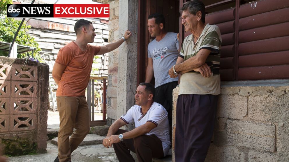 PHOTO: Elian Gonzalez with his father, grandfather and uncle at his birth home.