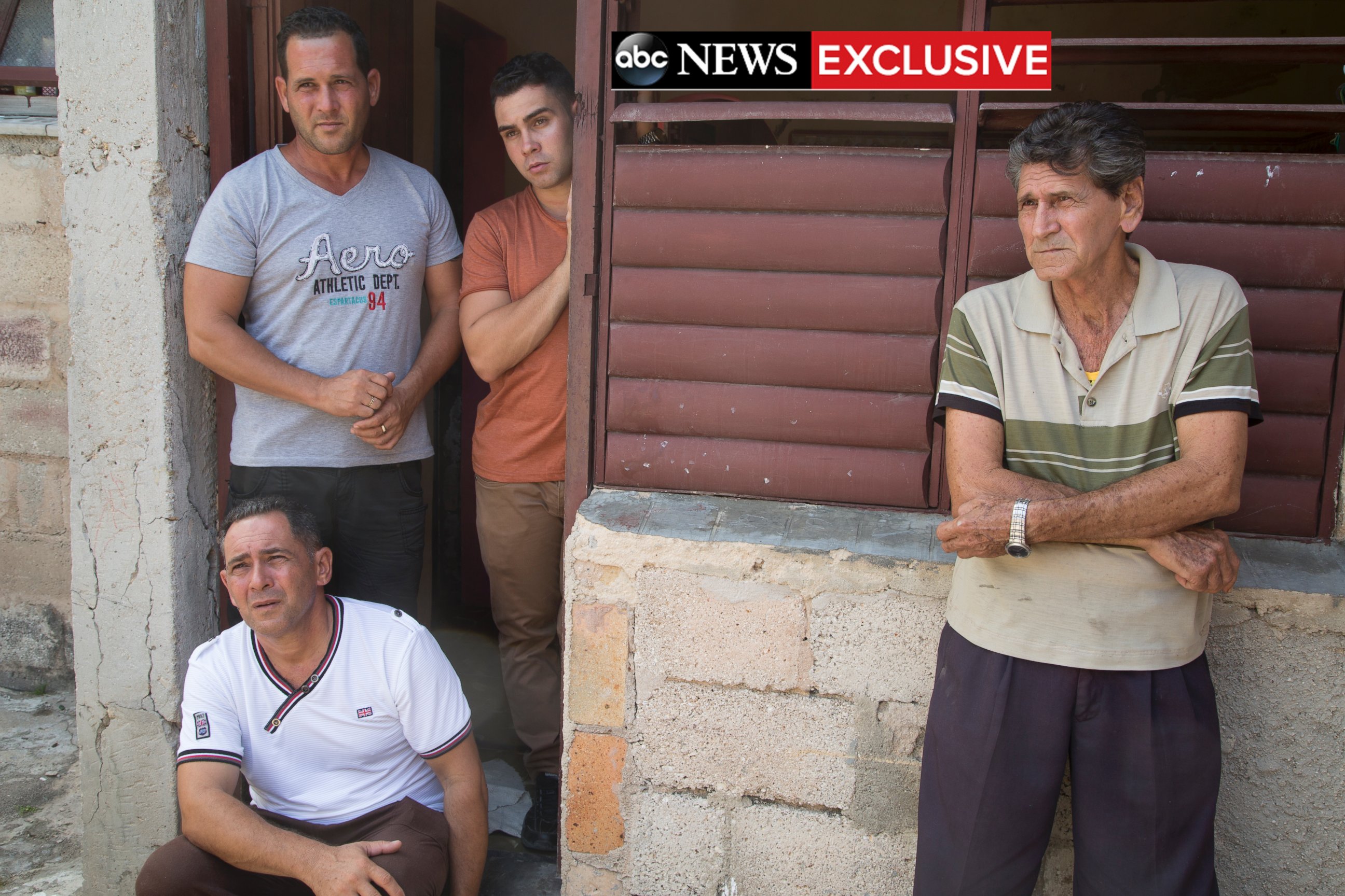 PHOTO: Elian Gonzalez with his father, grandfather and uncle at his birth home.
