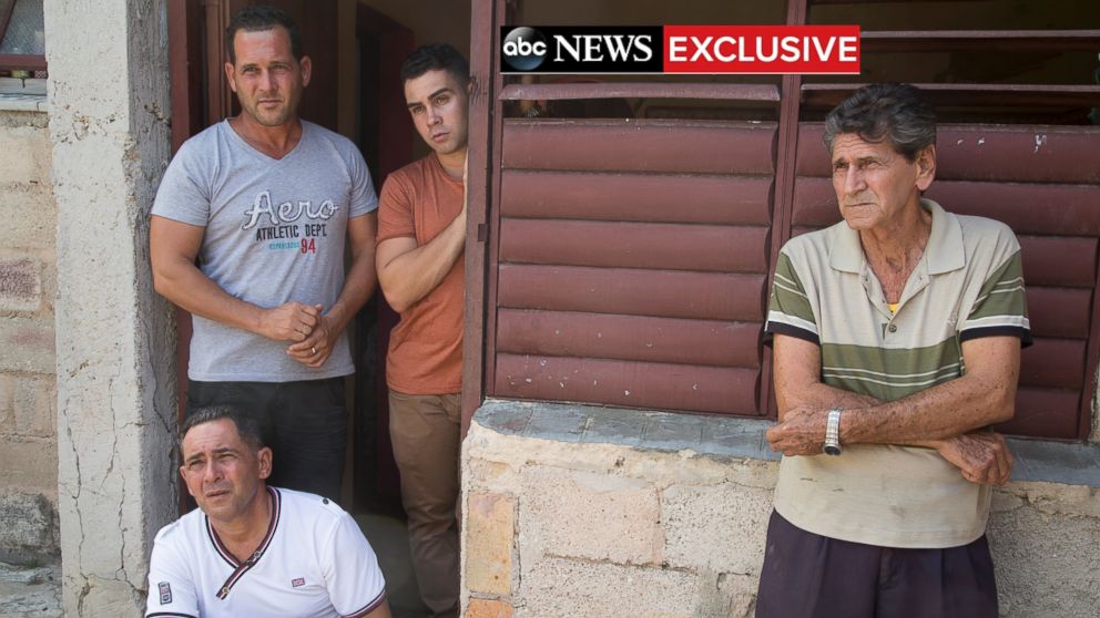 PHOTO: Elian Gonzalez with his father, grandfather and uncle at his birth home.
