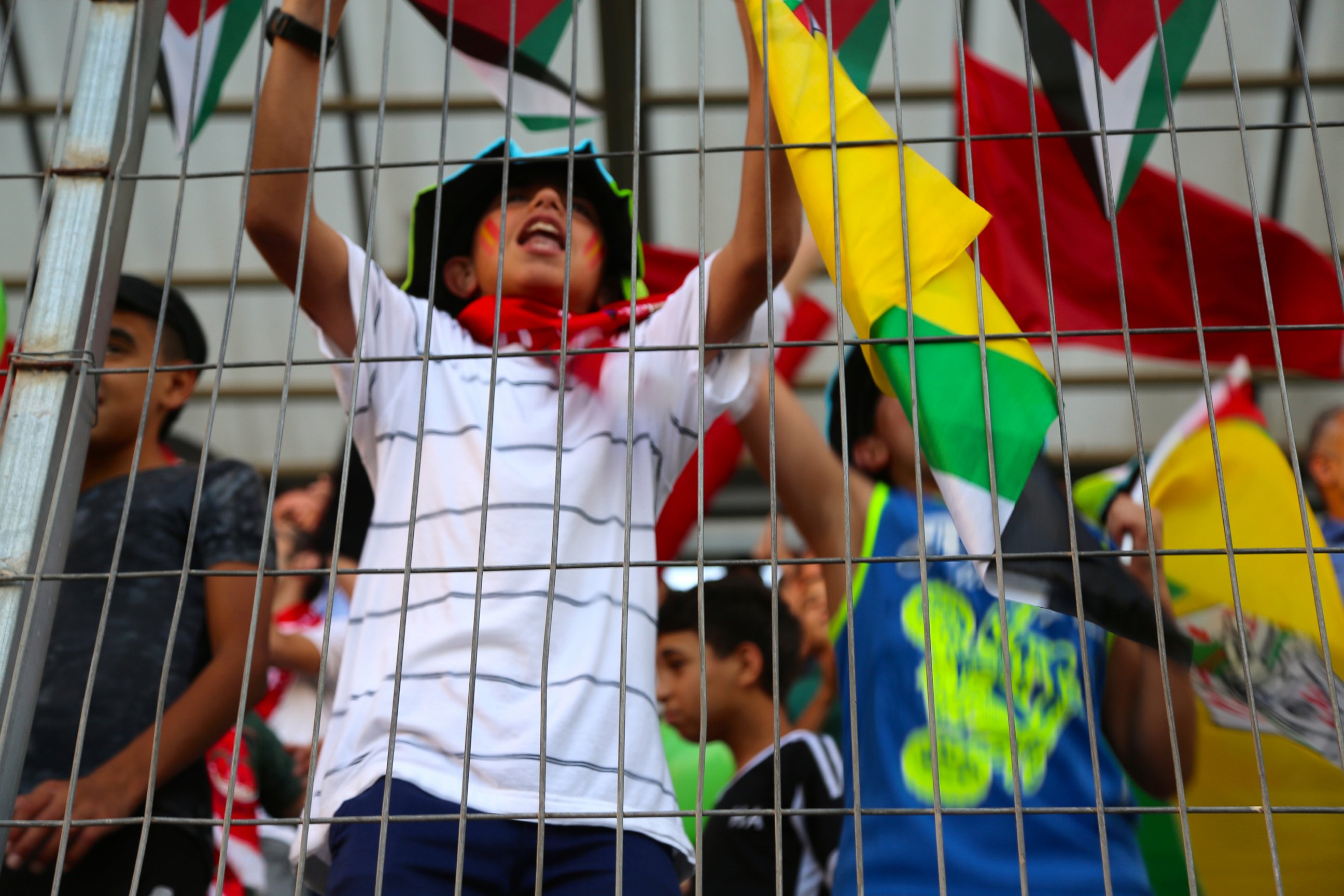 PHOTO: Kids cheering at the Palestine Cup final match. 