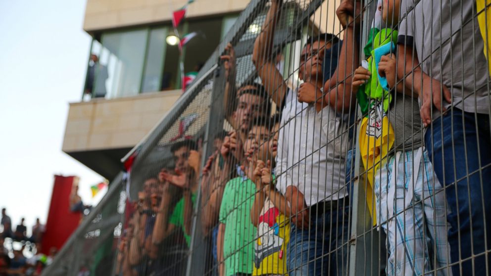 PHOTO: Die hard soccer fans packed into Hebron's main stadium for the Palestine Cup final match. 