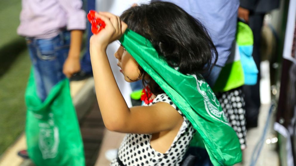 PHOTO: One of the youngest fans at the Palestine Cup final match looks on nervously as the clock ticks down.