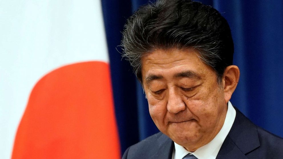 PHOTO: Japanese Prime Minister Shinzo Abe reacts during a news conference at the prime minister's official residence in Tokyo, Japan, August 28, 2020. 